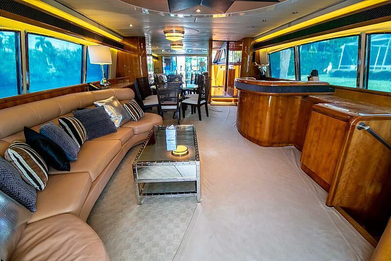 a room with a couch and a table aboard ALMAR Yacht for Sale