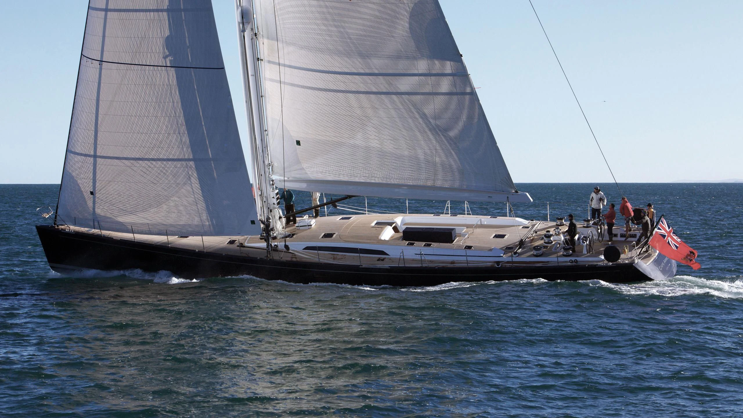 a sailboat with people on it aboard GRILLO PARLANTE Yacht for Sale
