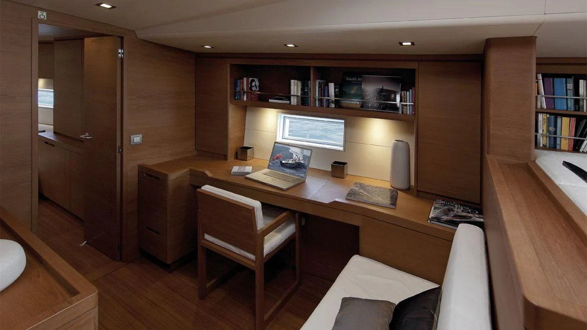 a room with a desk and a computer aboard GRILLO PARLANTE Yacht for Sale