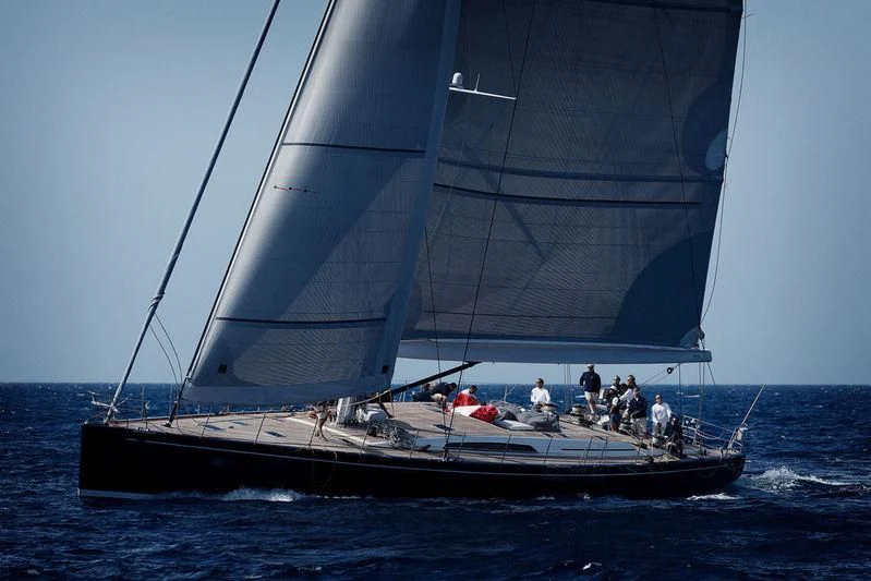 a sailboat with people on it aboard GRILLO PARLANTE Yacht for Sale