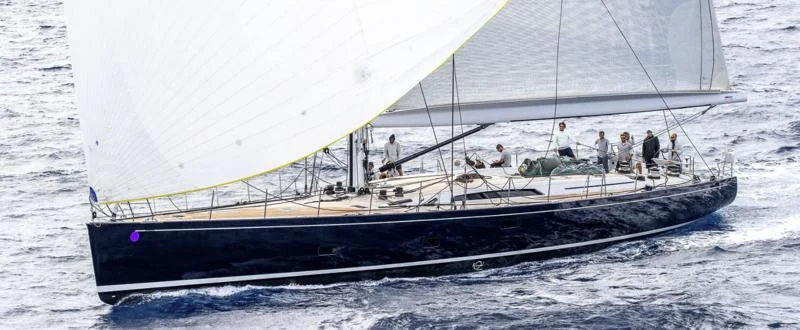 a sailboat with people on it aboard GRILLO PARLANTE Yacht for Sale