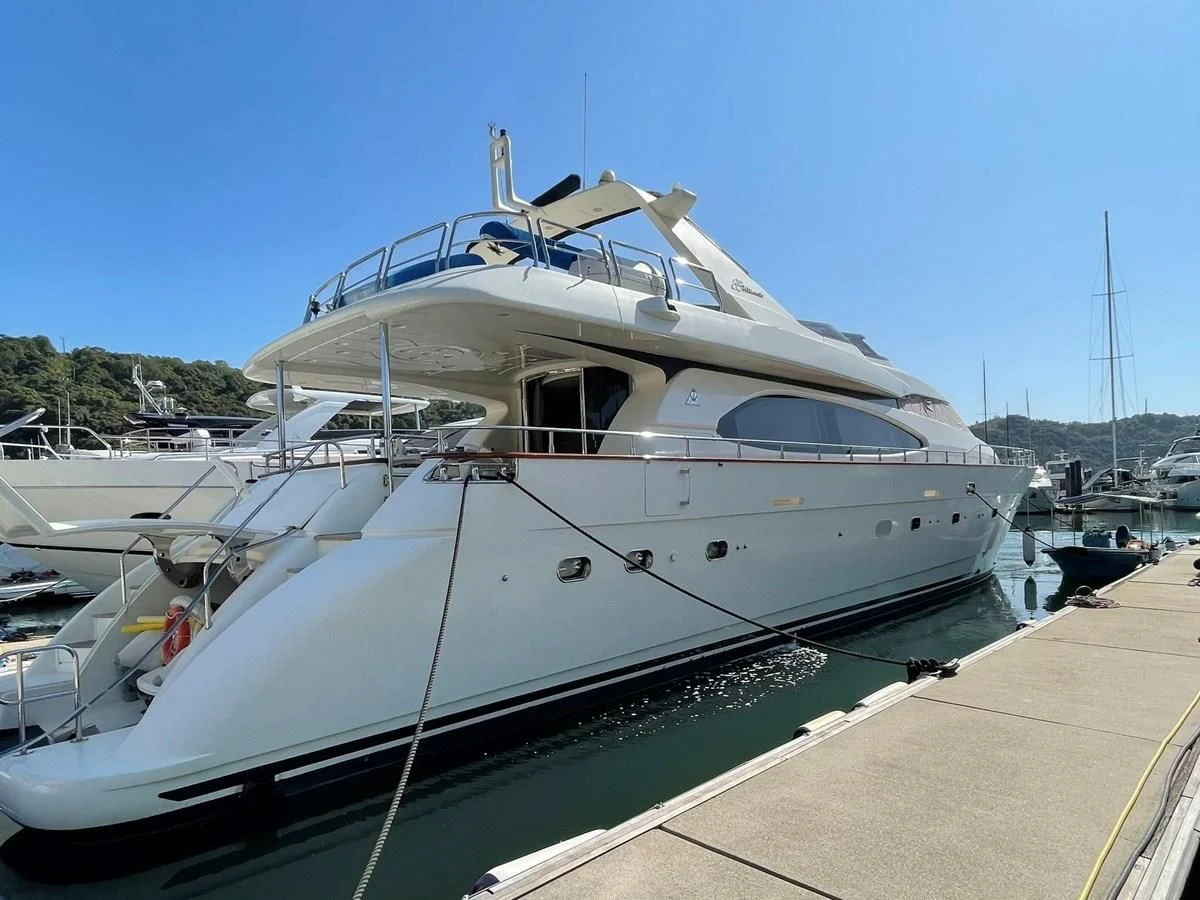 a white boat docked aboard AZIMUT 85 ULTIMATE Yacht for Sale
