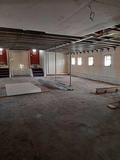 a room with a large ceiling and a few doors aboard EVANGELIYA Yacht for Sale