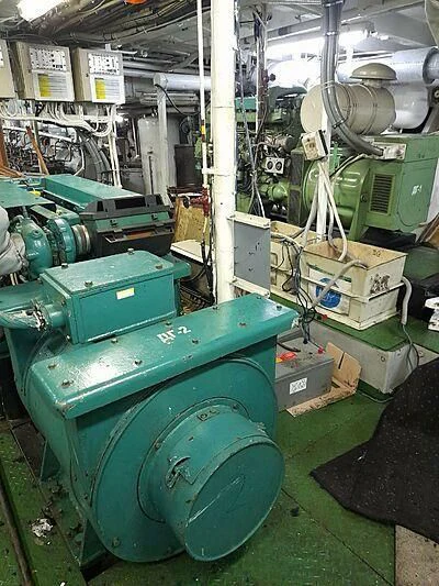 a large green machine aboard EVANGELIYA Yacht for Sale