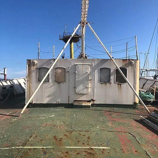 a large white ship aboard EVANGELIYA Yacht for Sale
