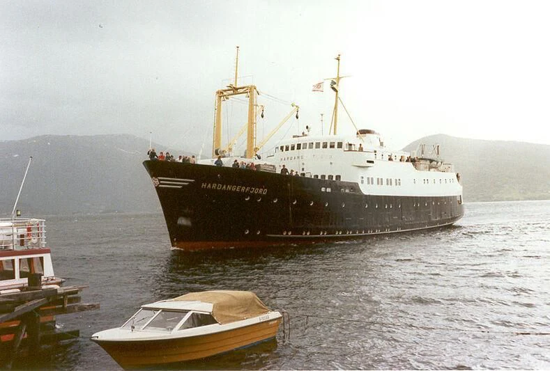 a large ship in the water aboard EVANGELIYA Yacht for Sale