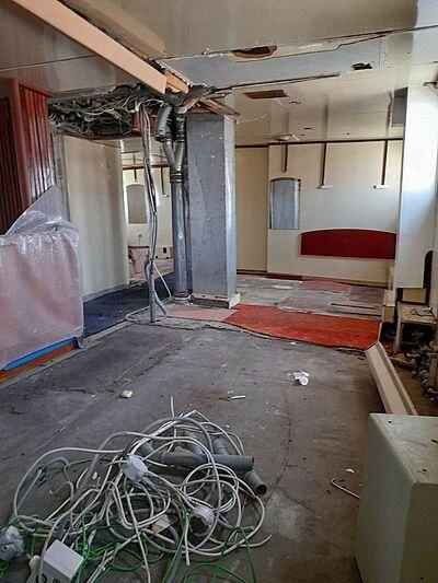 a room with a lot of debris aboard EVANGELIYA Yacht for Sale