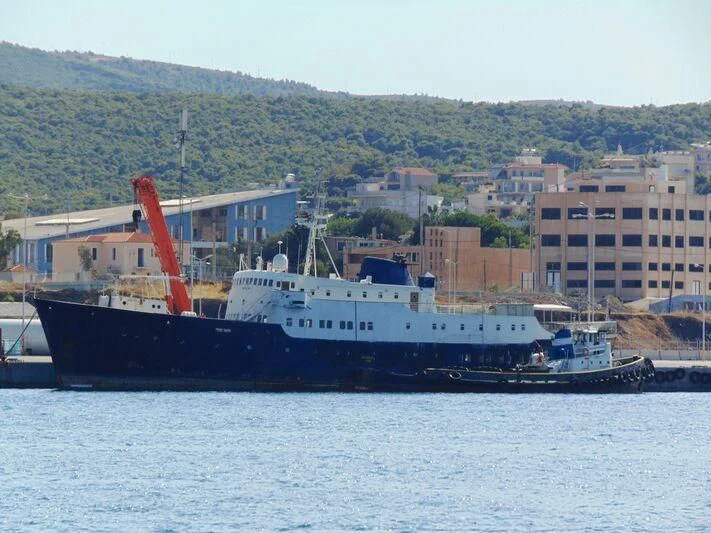 a large ship in the water aboard EVANGELIYA Yacht for Sale