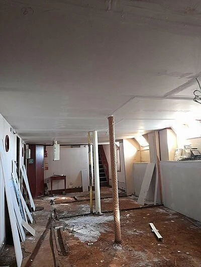 a room with a ladder and a wood floor aboard EVANGELIYA Yacht for Sale