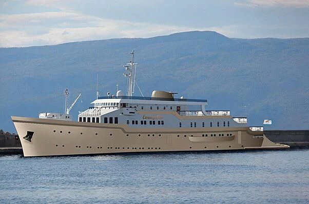 a large ship in the water aboard EVANGELIYA Yacht for Sale