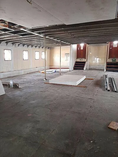 a large room with a large floor aboard EVANGELIYA Yacht for Sale