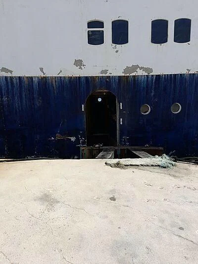 a blue building with a hole in the side aboard EVANGELIYA Yacht for Sale
