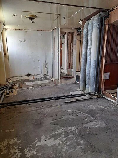 a room with a large pipe aboard EVANGELIYA Yacht for Sale