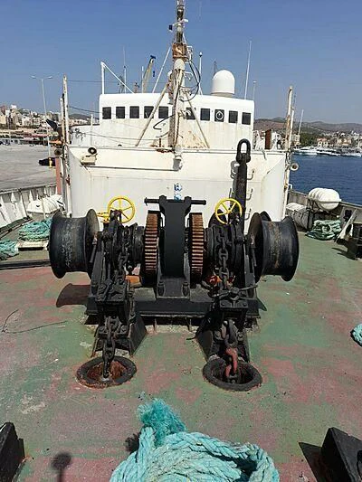a large boat on a trailer aboard EVANGELIYA Yacht for Sale