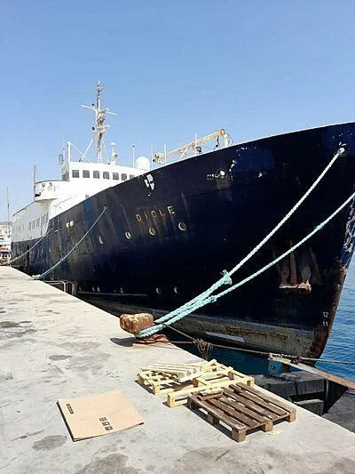a large ship docked aboard EVANGELIYA Yacht for Sale