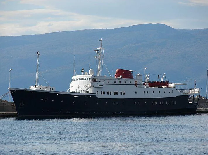 a large ship in the water aboard EVANGELIYA Yacht for Sale
