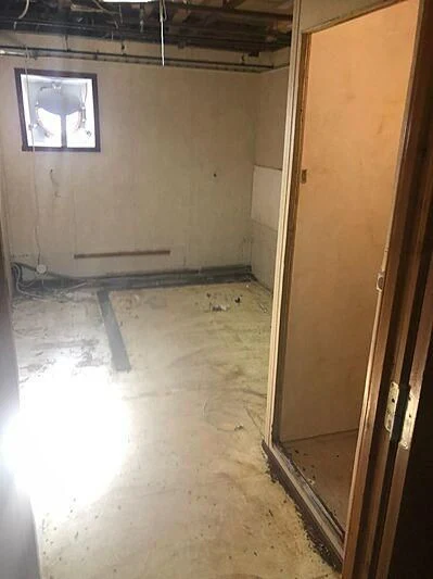 a room with a door and a picture on the wall aboard EVANGELIYA Yacht for Sale