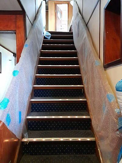 a set of stairs in a house aboard EVANGELIYA Yacht for Sale