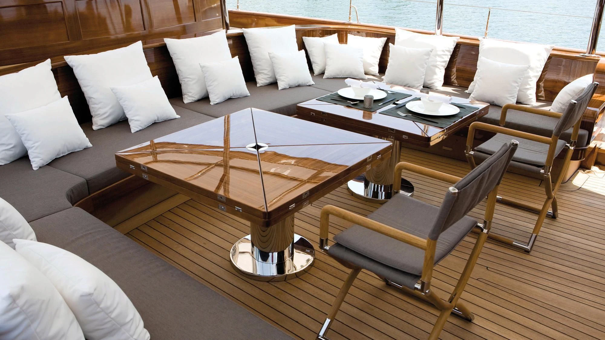 a table and chairs in a room aboard ROXANE Yacht for Sale