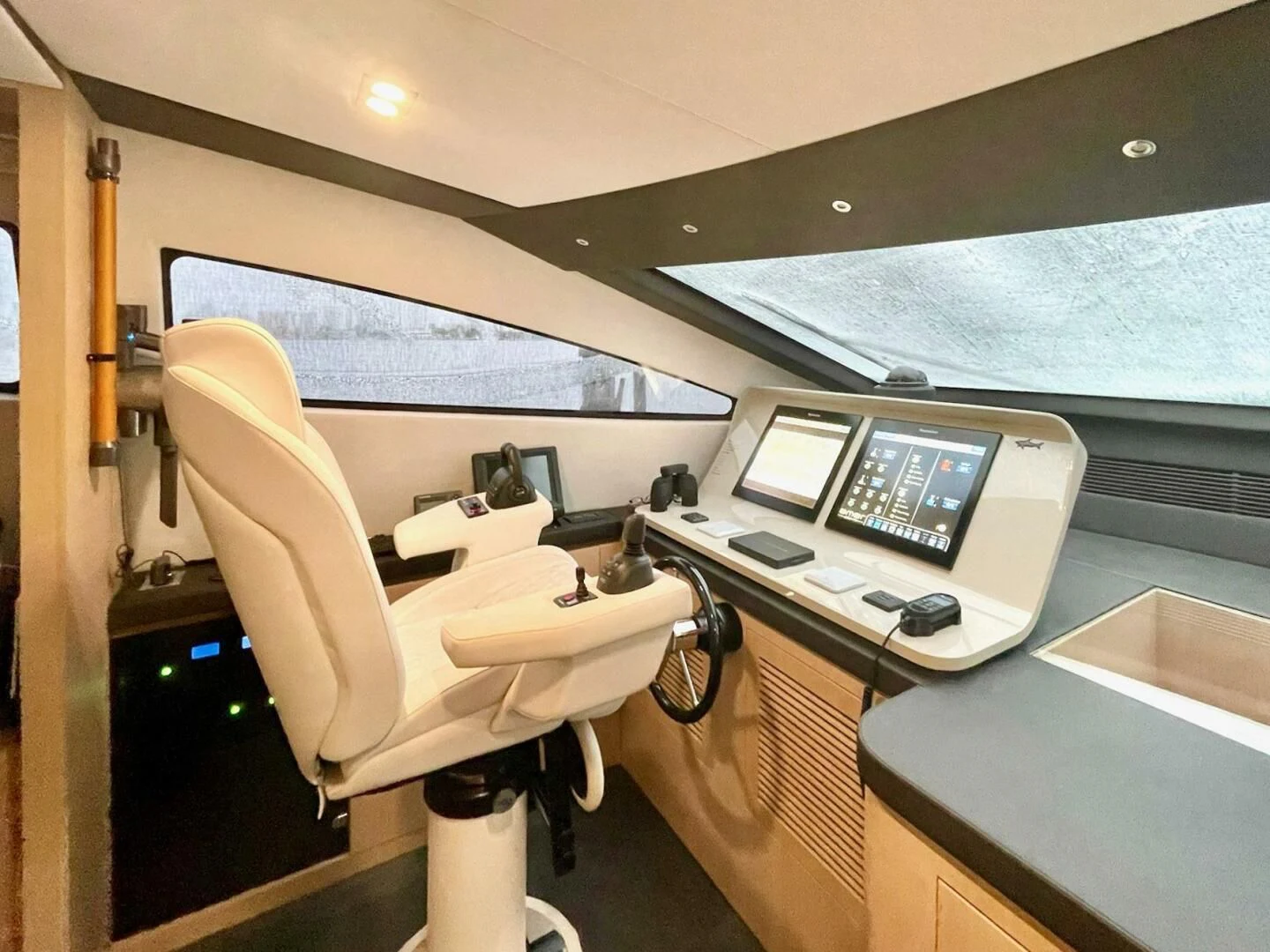 a room with a desk and a chair aboard SEA METRI V Yacht for Sale