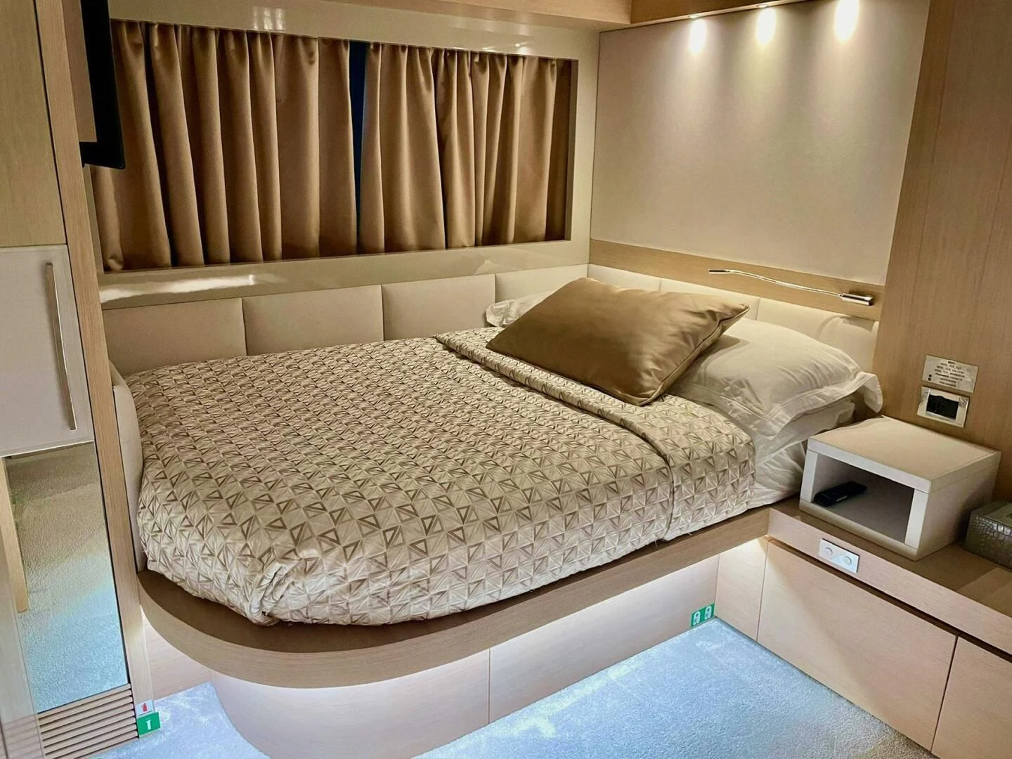 a bed with white sheets aboard SEA METRI V Yacht for Sale