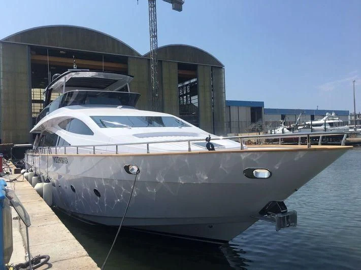 a boat docked at a pier aboard SEA METRI V Yacht for Sale