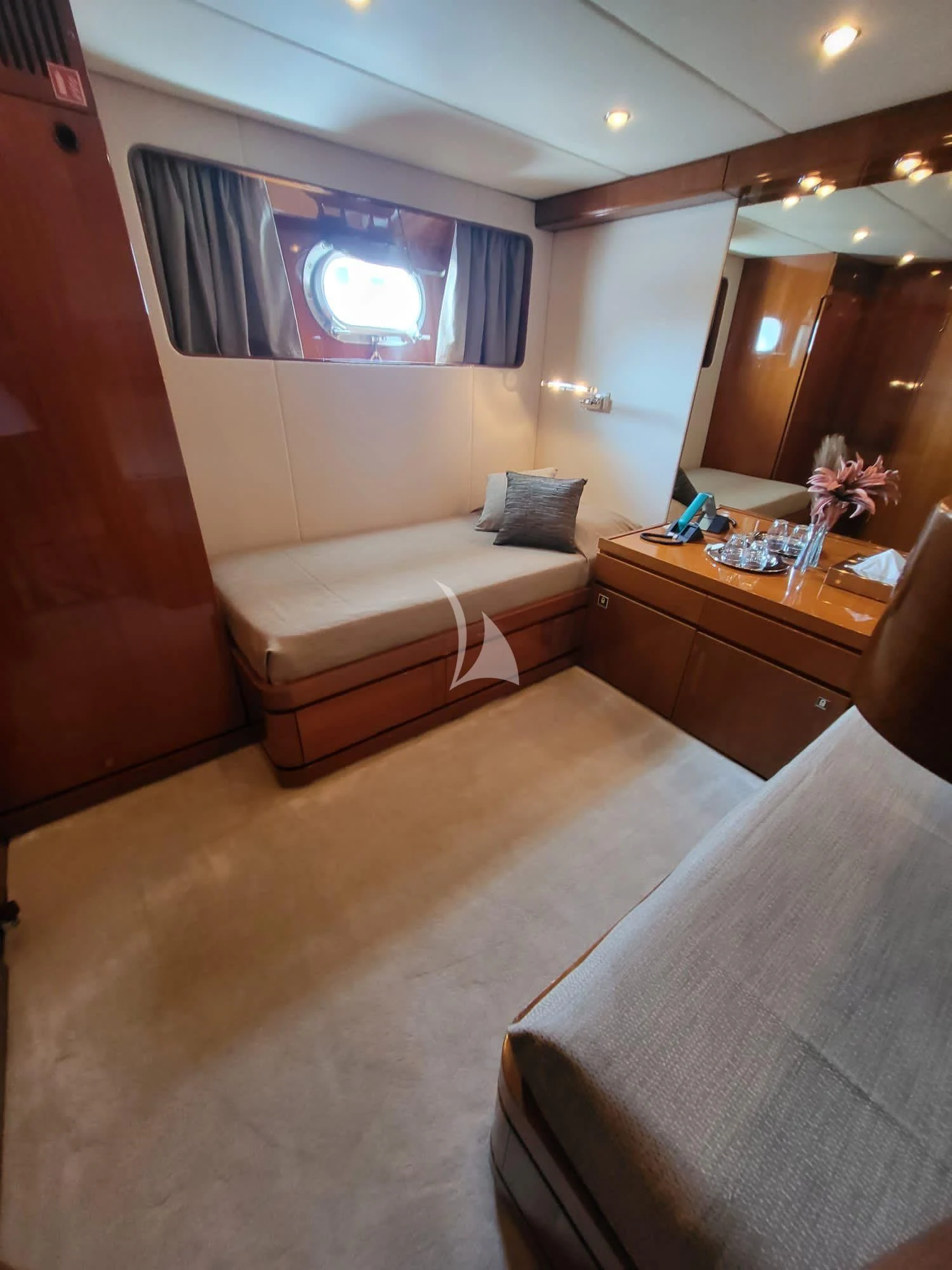 a room with a bed and a desk aboard SOUTH PAW C Yacht for Sale