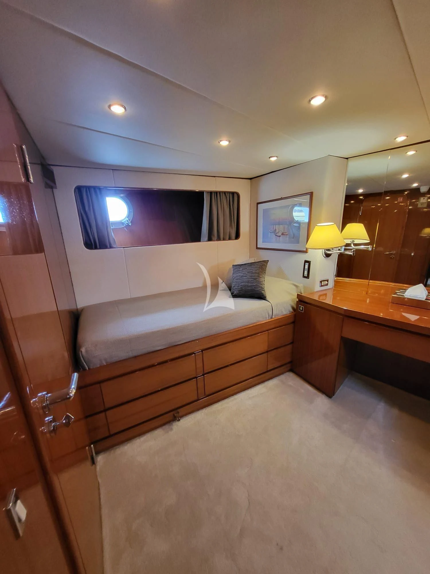 a hotel room with a bed and desk aboard SOUTH PAW C Yacht for Sale