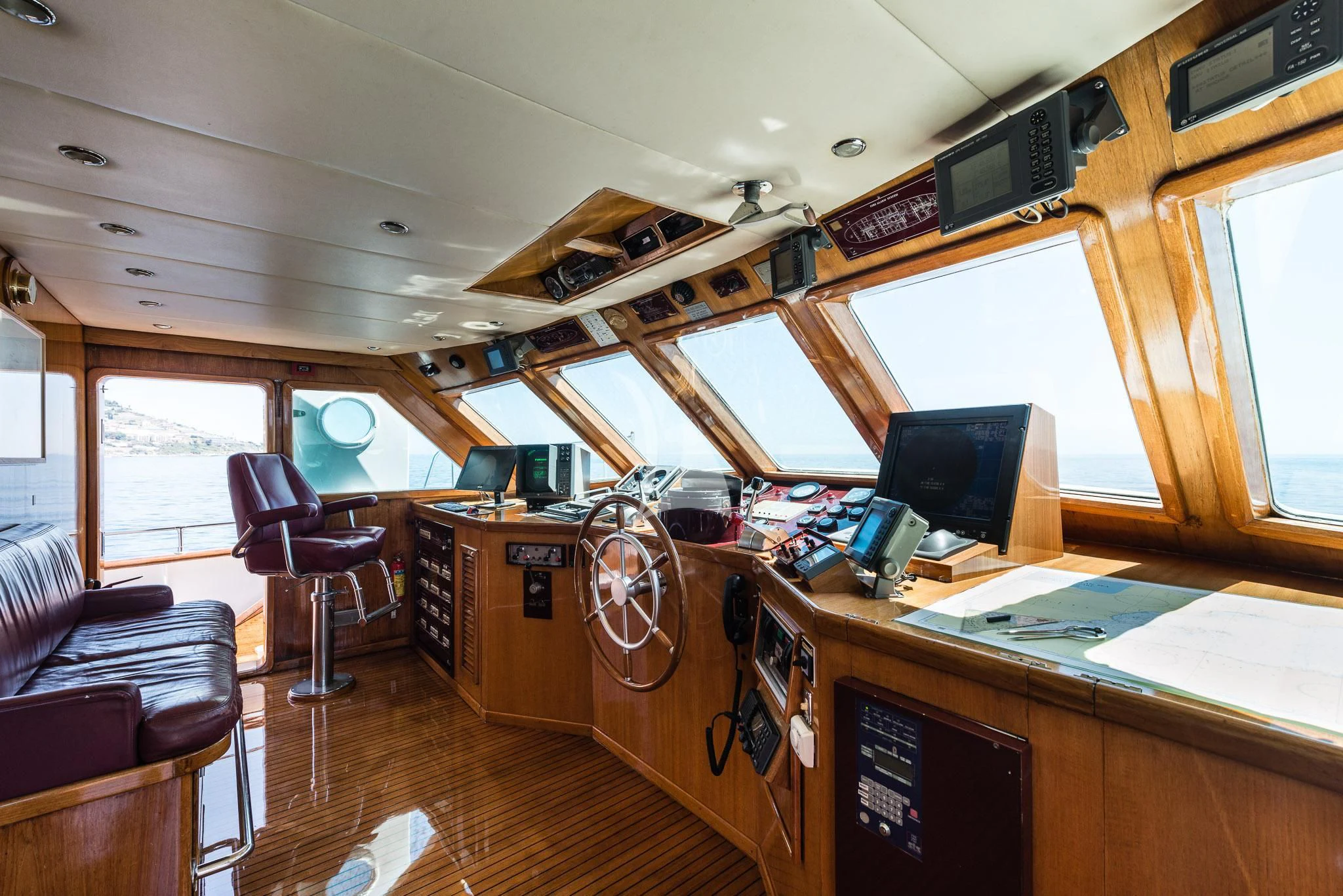 a room with a desk and computer aboard SOUTH PAW C Yacht for Sale
