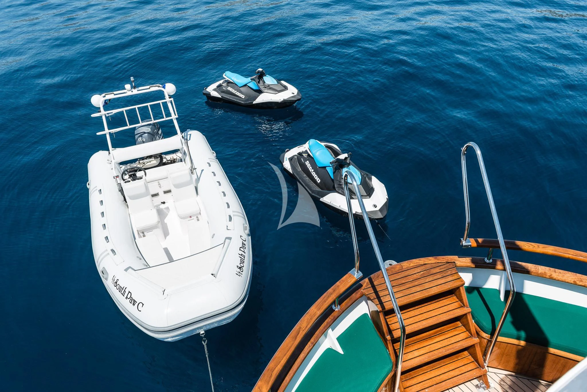 a boat and a boat in the water aboard SOUTH PAW C Yacht for Sale