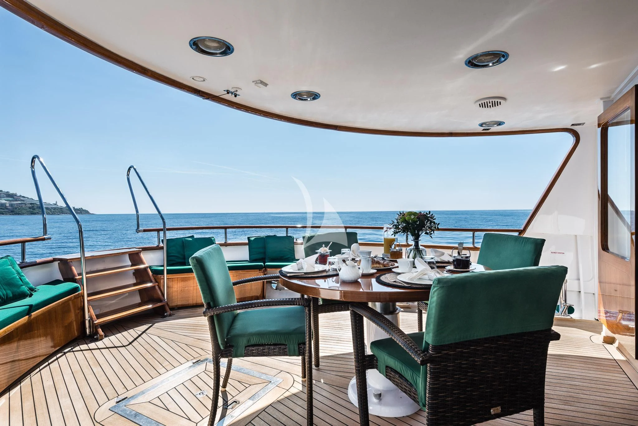 a boat with a table and chairs aboard SOUTH PAW C Yacht for Sale