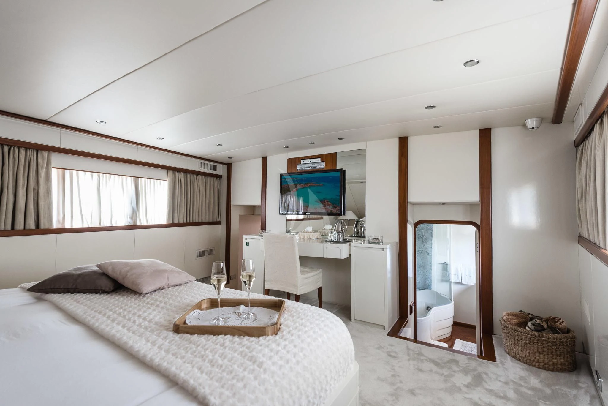 a bedroom with a large bed aboard SOUTH PAW C Yacht for Sale