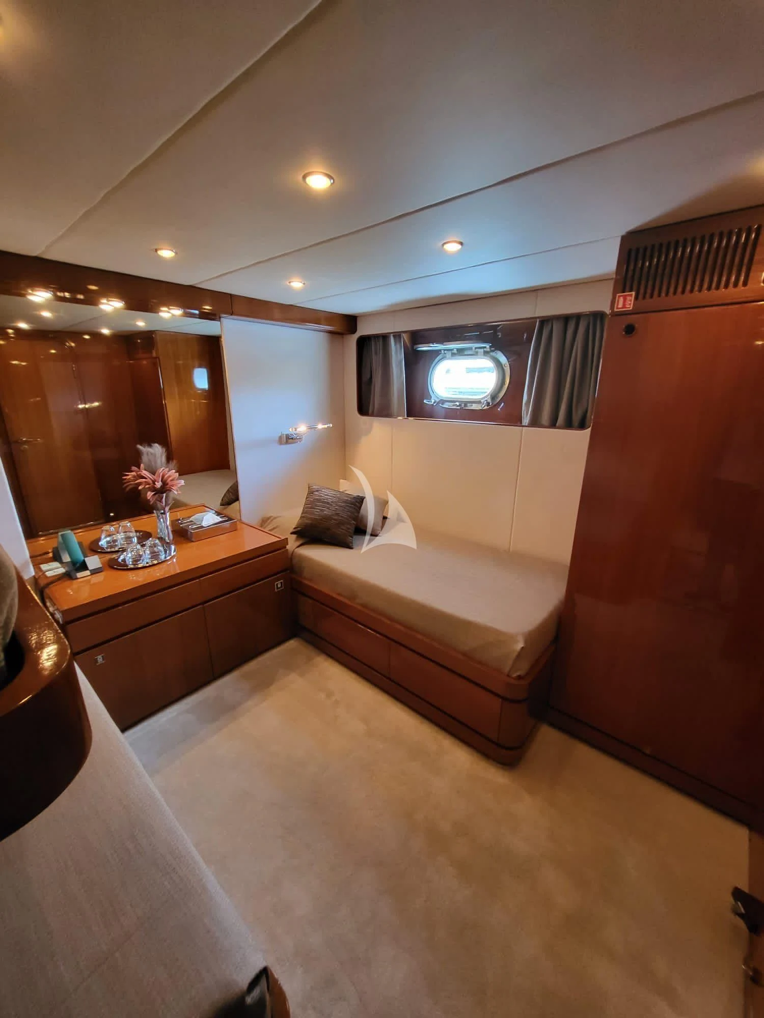 a hotel room with a bed and a tv aboard SOUTH PAW C Yacht for Sale