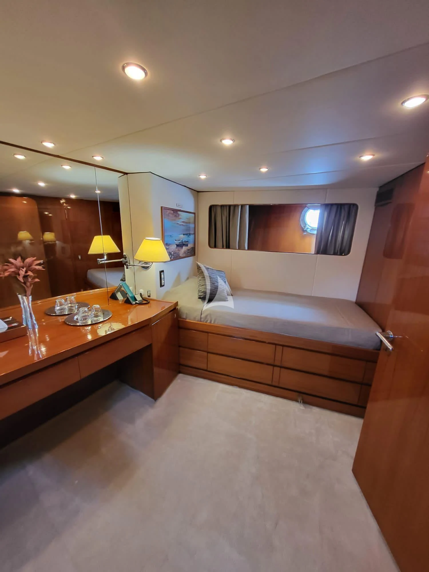a hotel room with a bed and desk aboard SOUTH PAW C Yacht for Sale
