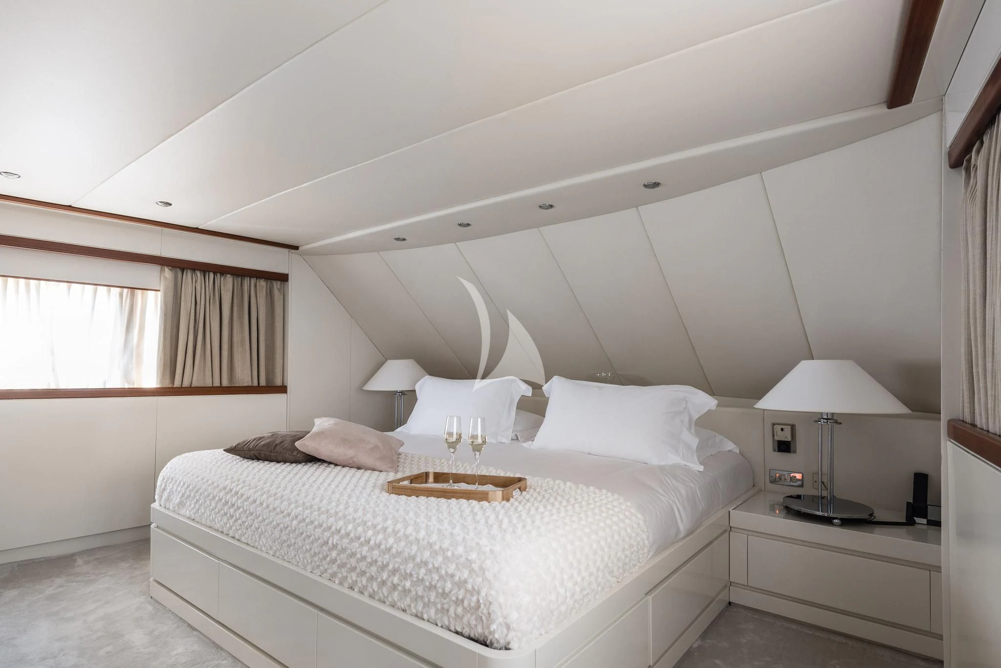 a bed with white sheets aboard SOUTH PAW C Yacht for Sale