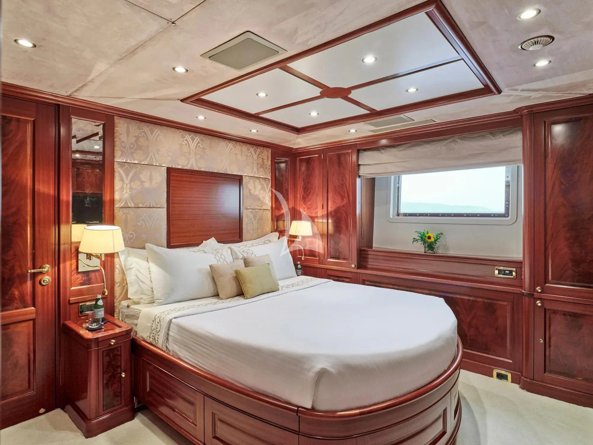 a bed in a room aboard OPTION B Yacht for Charter