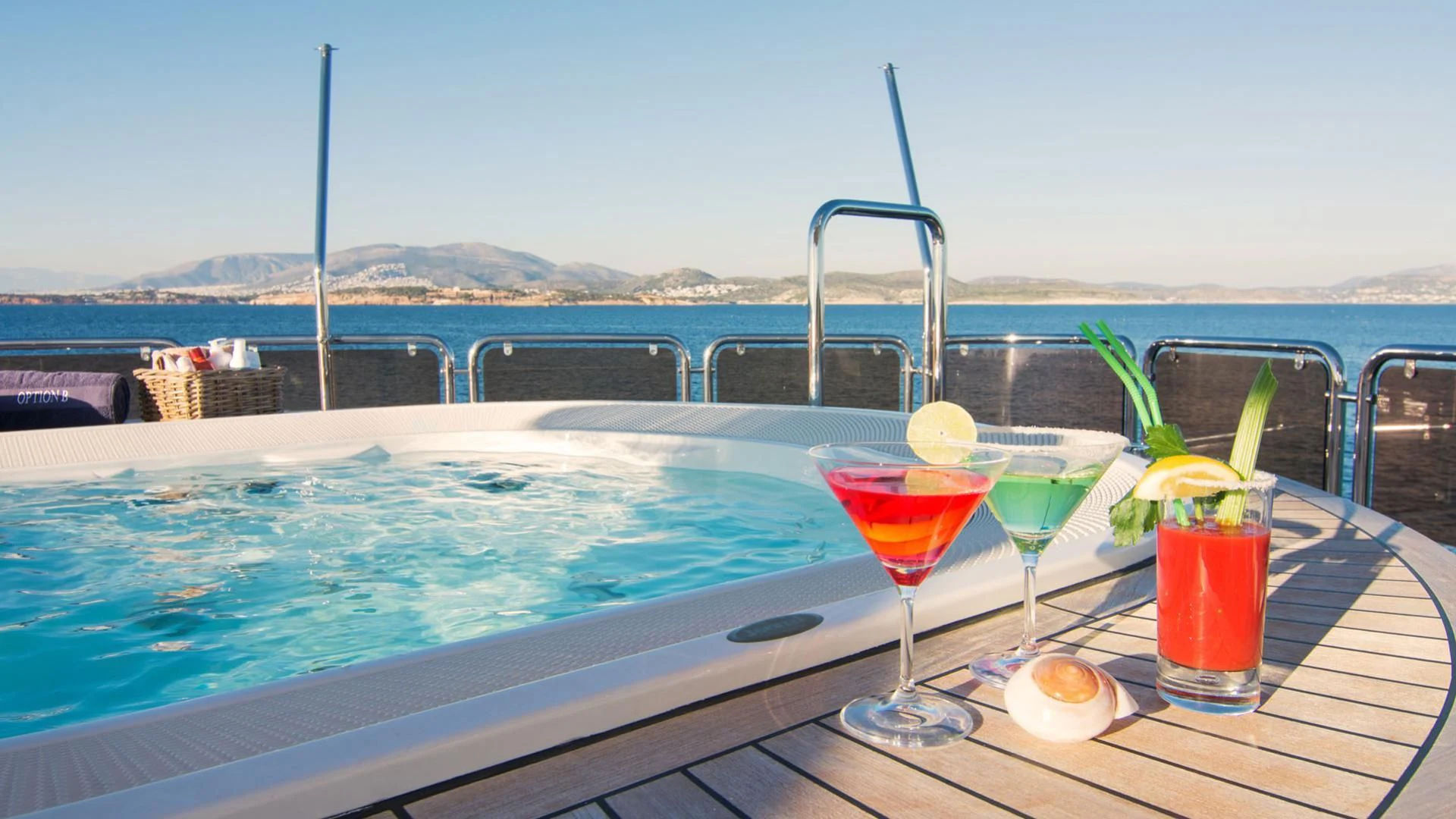 a group of drinks on a table aboard OPTION B Yacht for Charter