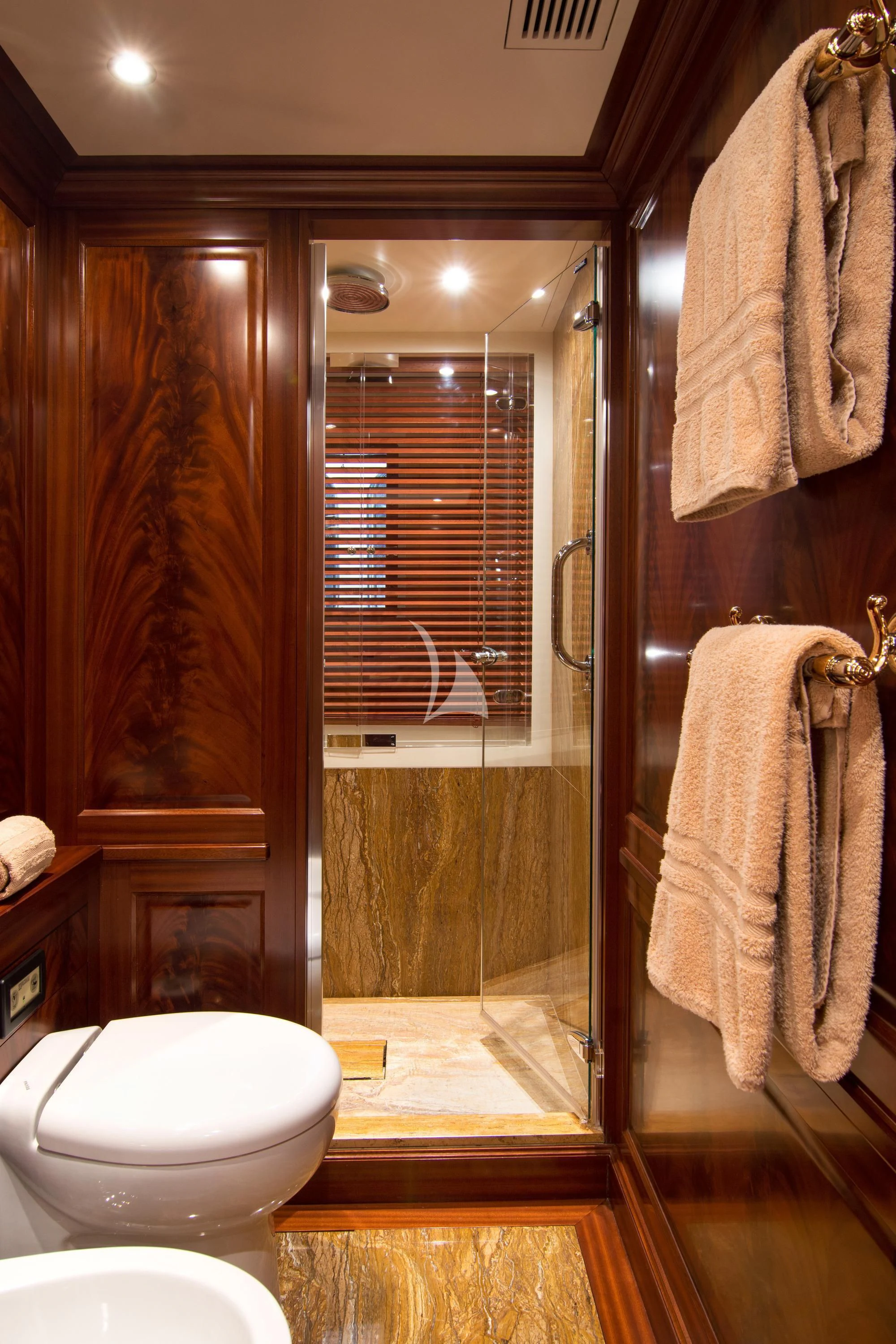 a bathroom with a shower and toilet aboard OPTION B Yacht for Charter