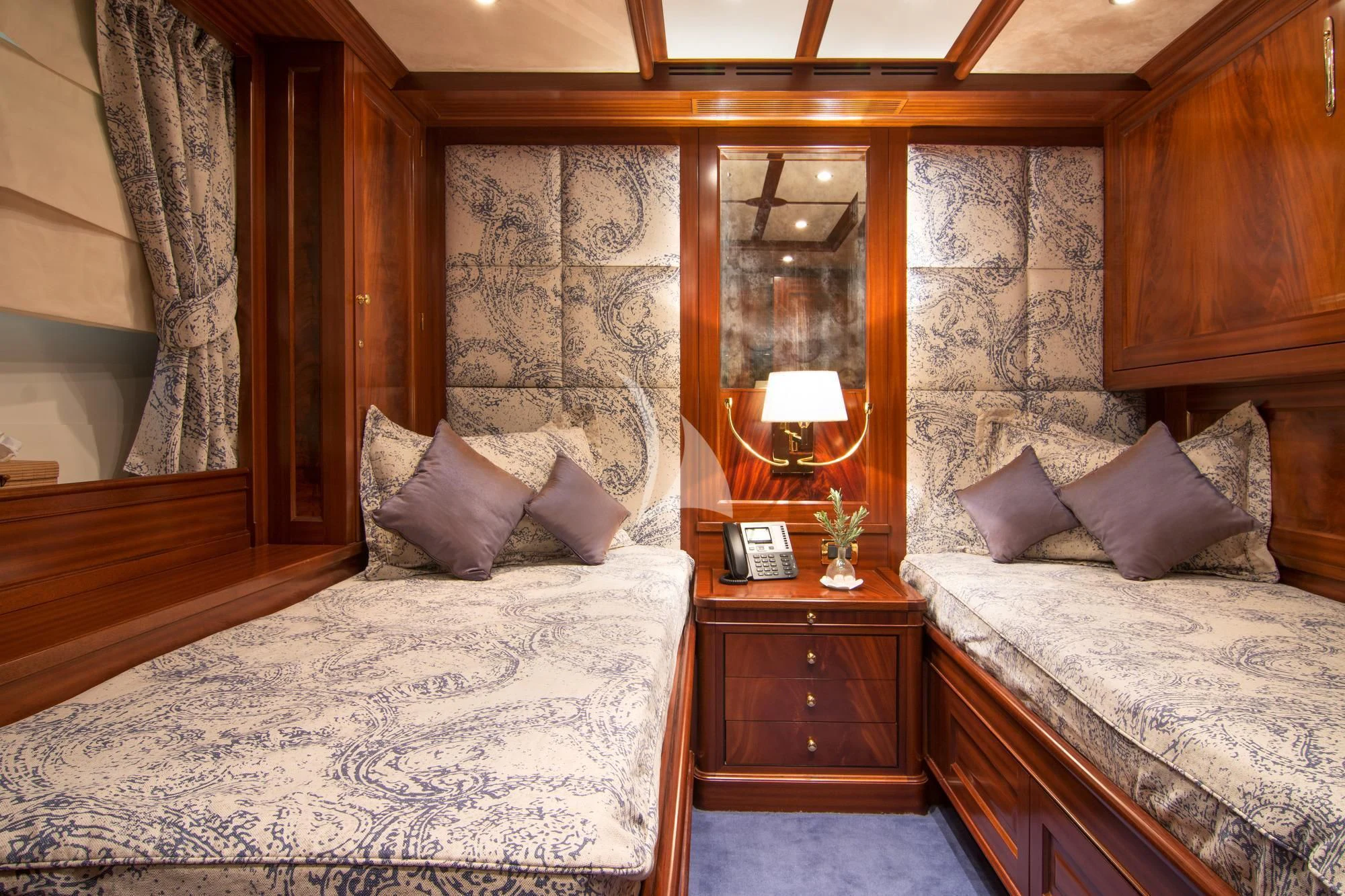 a room with two beds aboard OPTION B Yacht for Charter