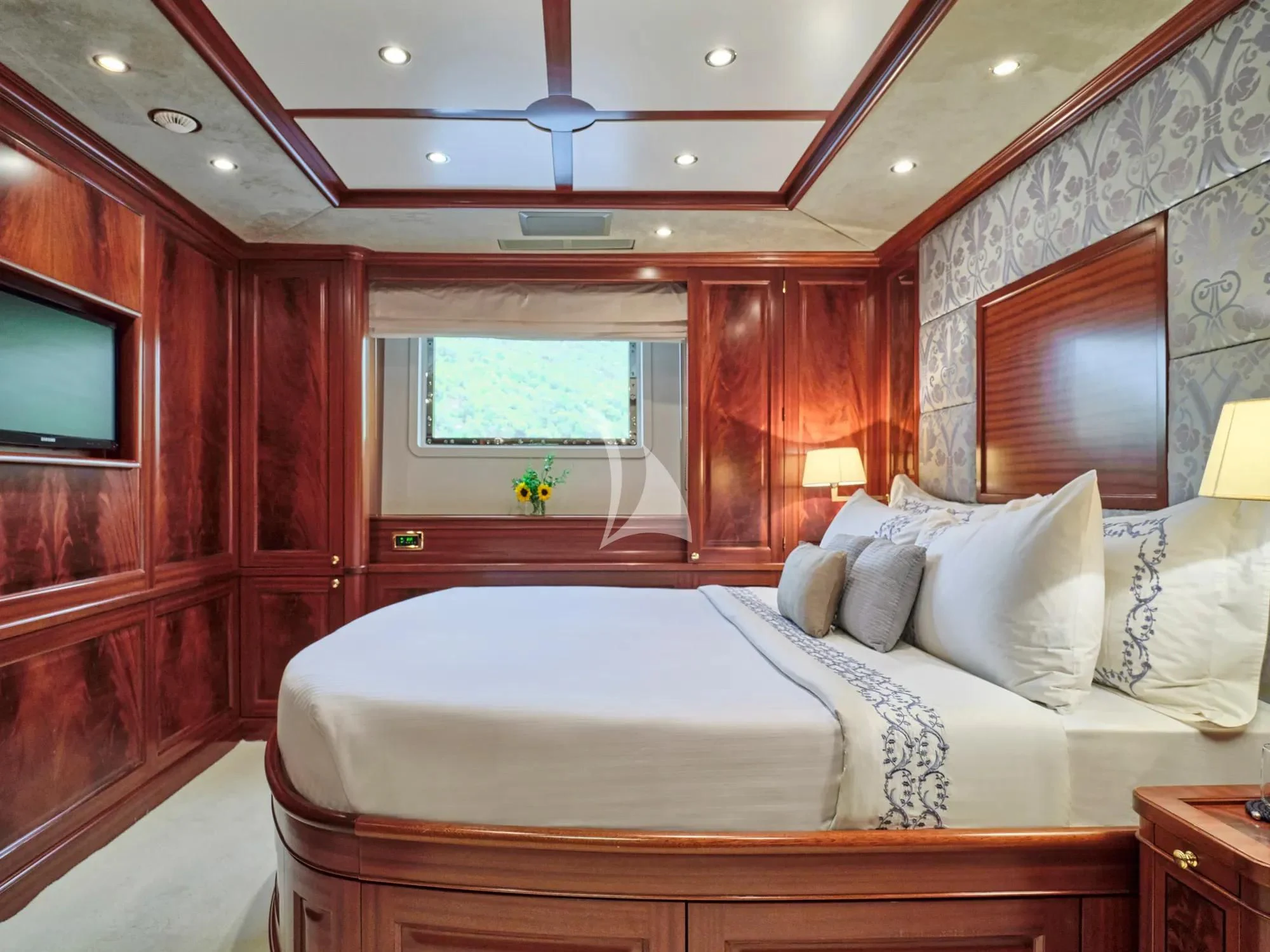 a bed in a room aboard OPTION B Yacht for Charter
