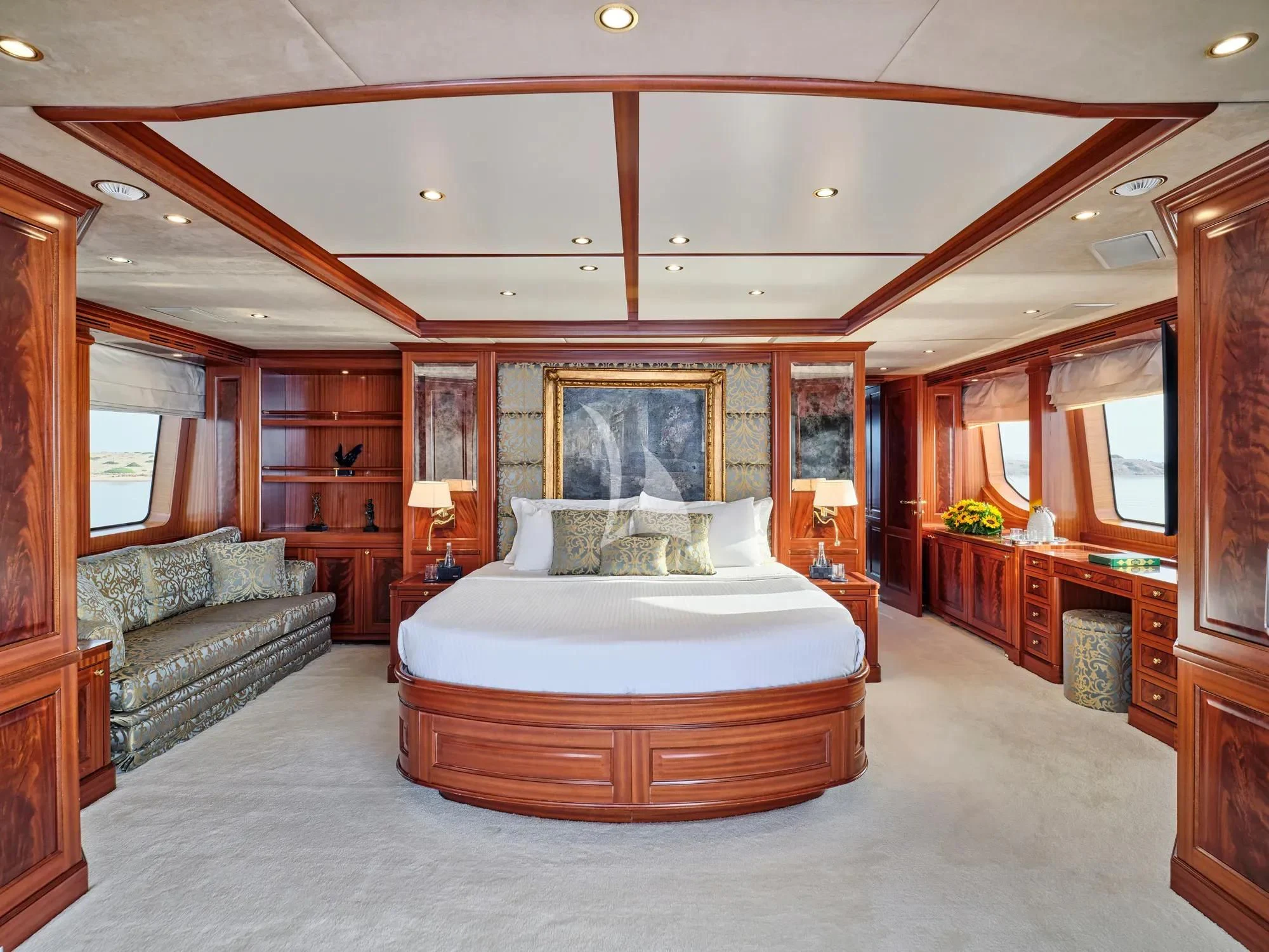 a large bedroom with a large bed aboard OPTION B Yacht for Charter