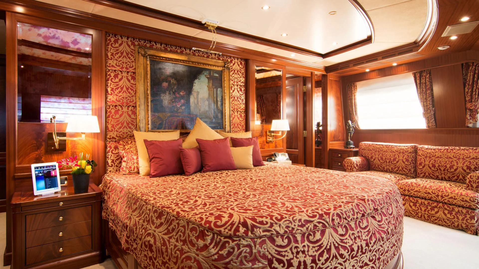 a large bed in a hotel room aboard OPTION B Yacht for Charter