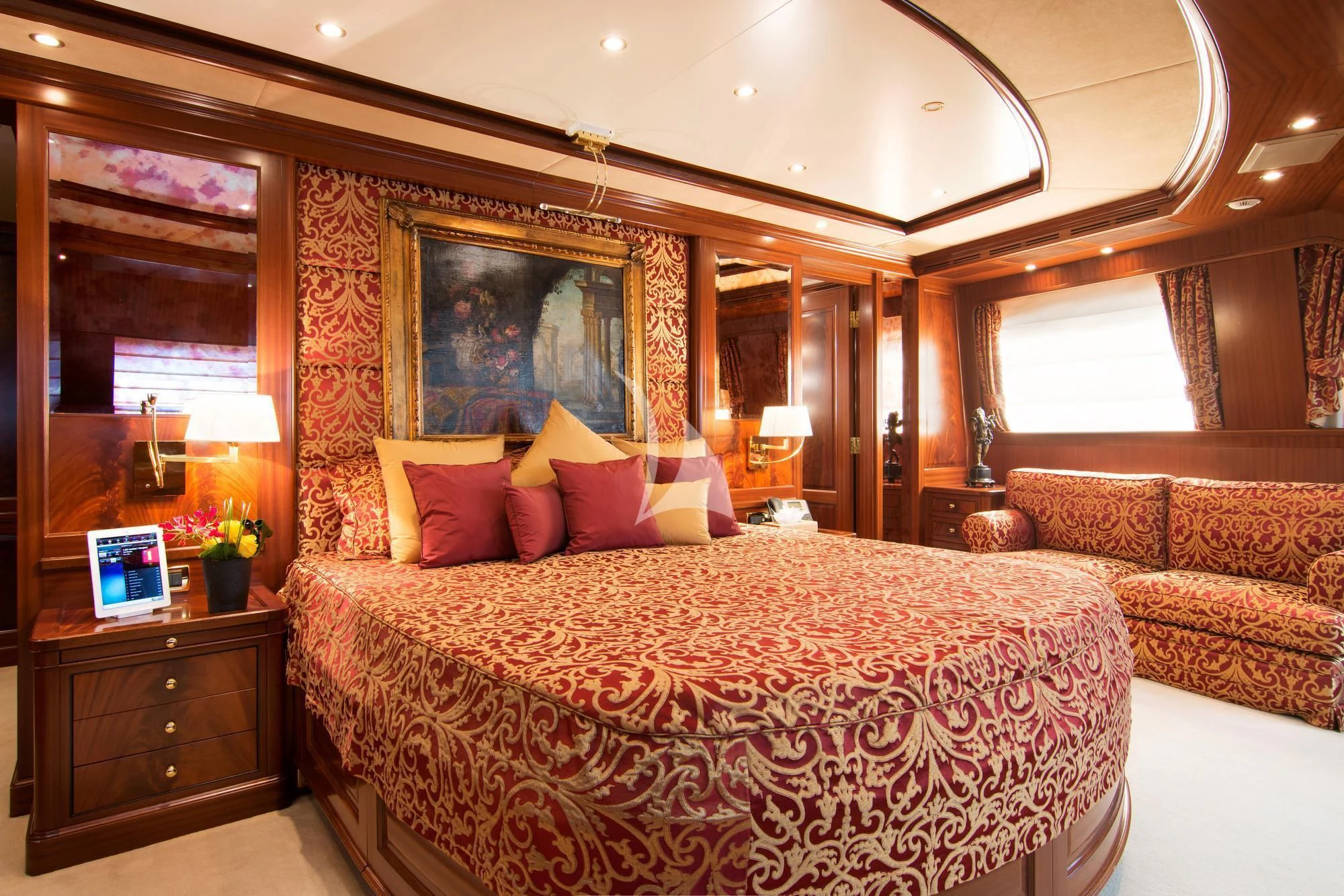 a large bed in a hotel room aboard OPTION B Yacht for Charter