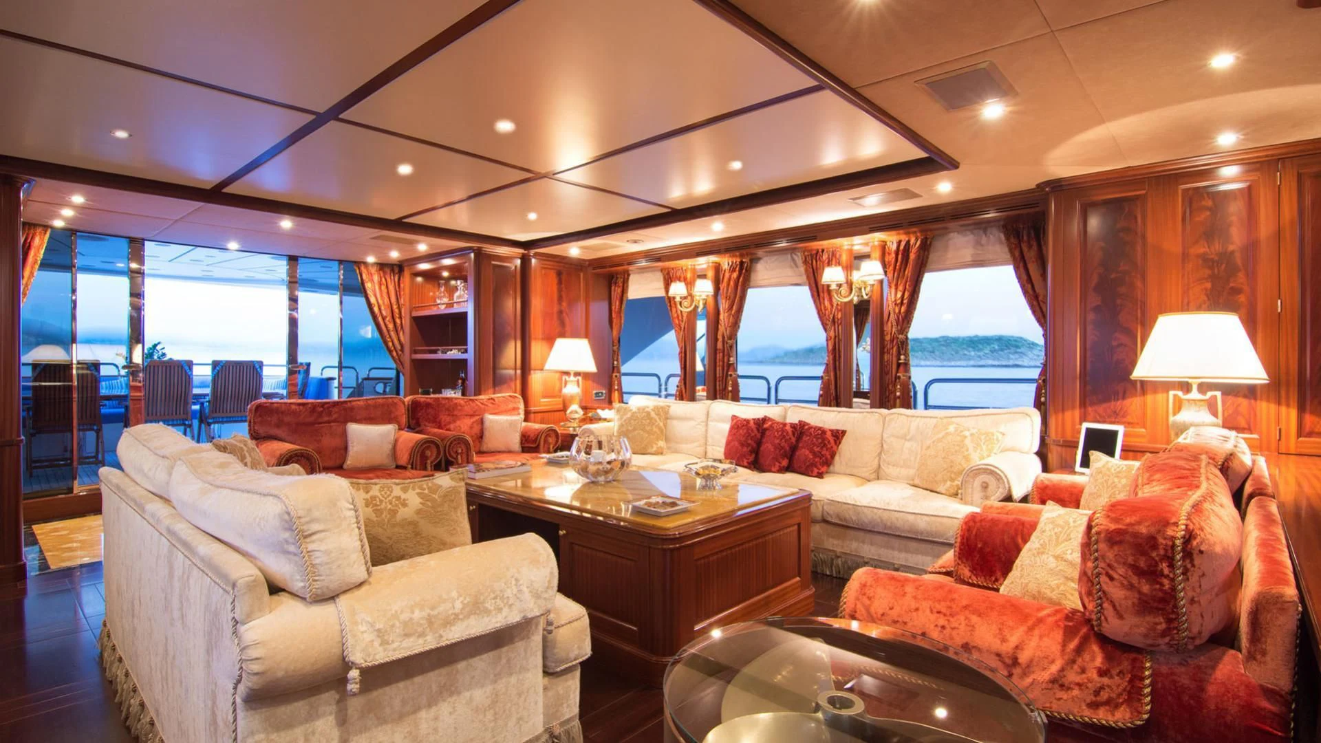 a living room with a large window aboard OPTION B Yacht for Charter
