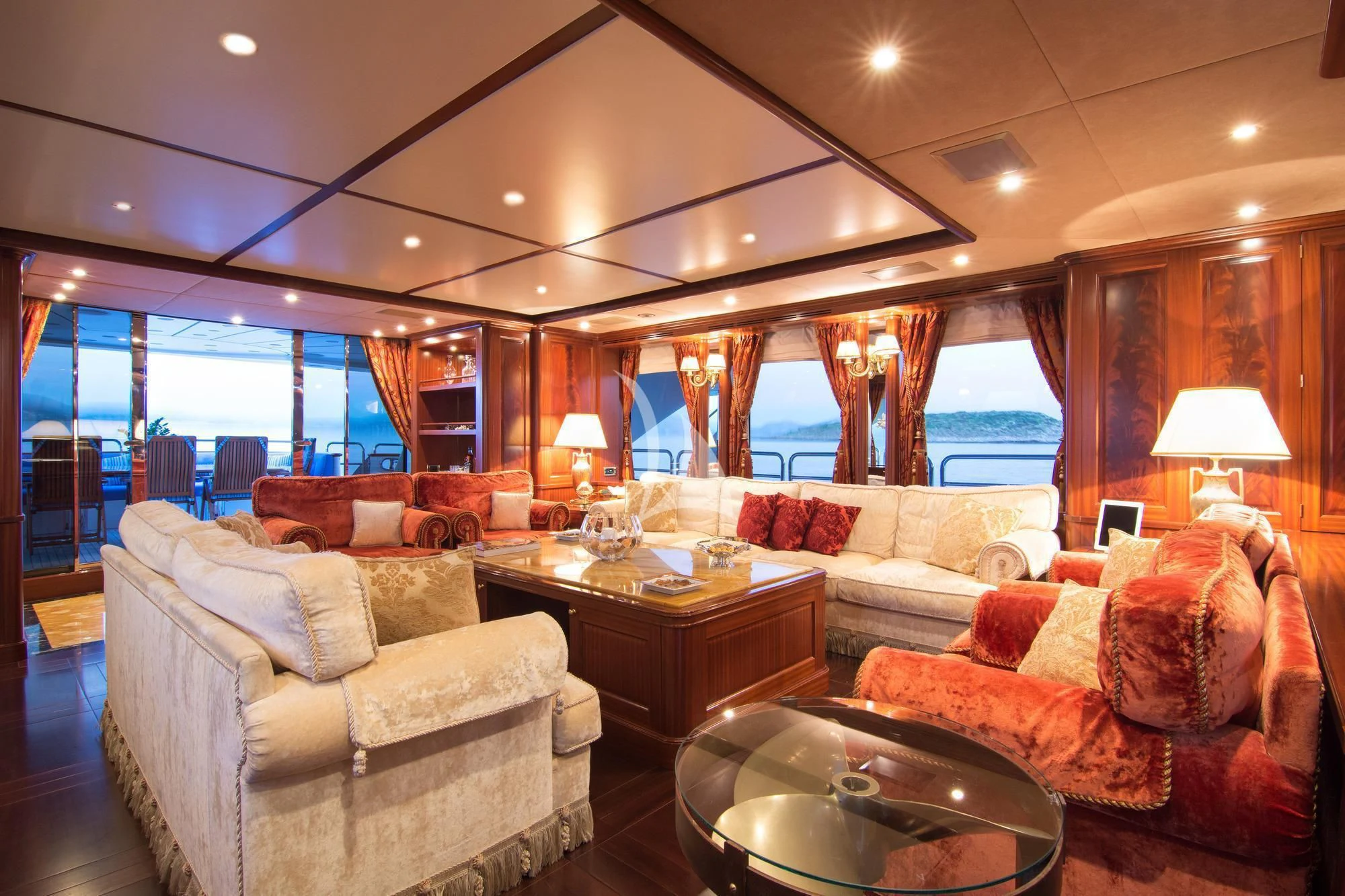 a living room with a large window aboard OPTION B Yacht for Charter