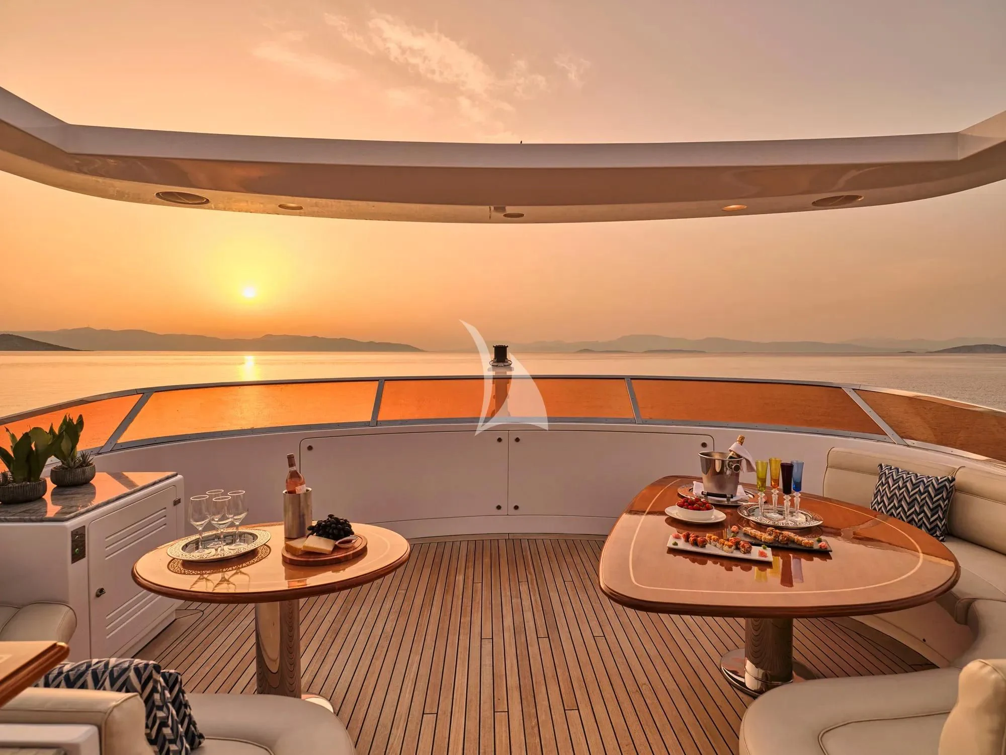 a room with a table and chairs aboard OPTION B Yacht for Charter