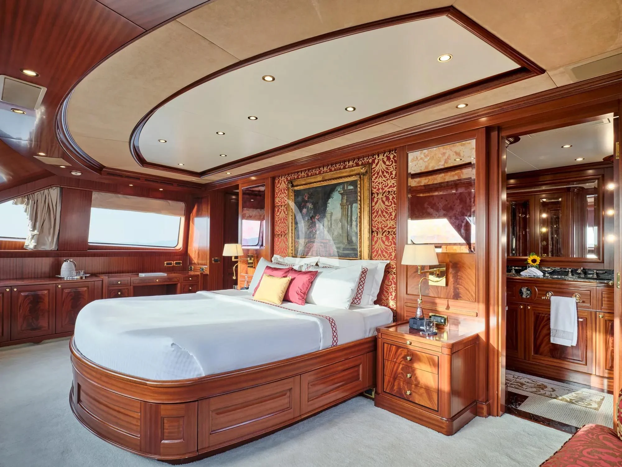 a large bedroom with a large bed aboard OPTION B Yacht for Charter