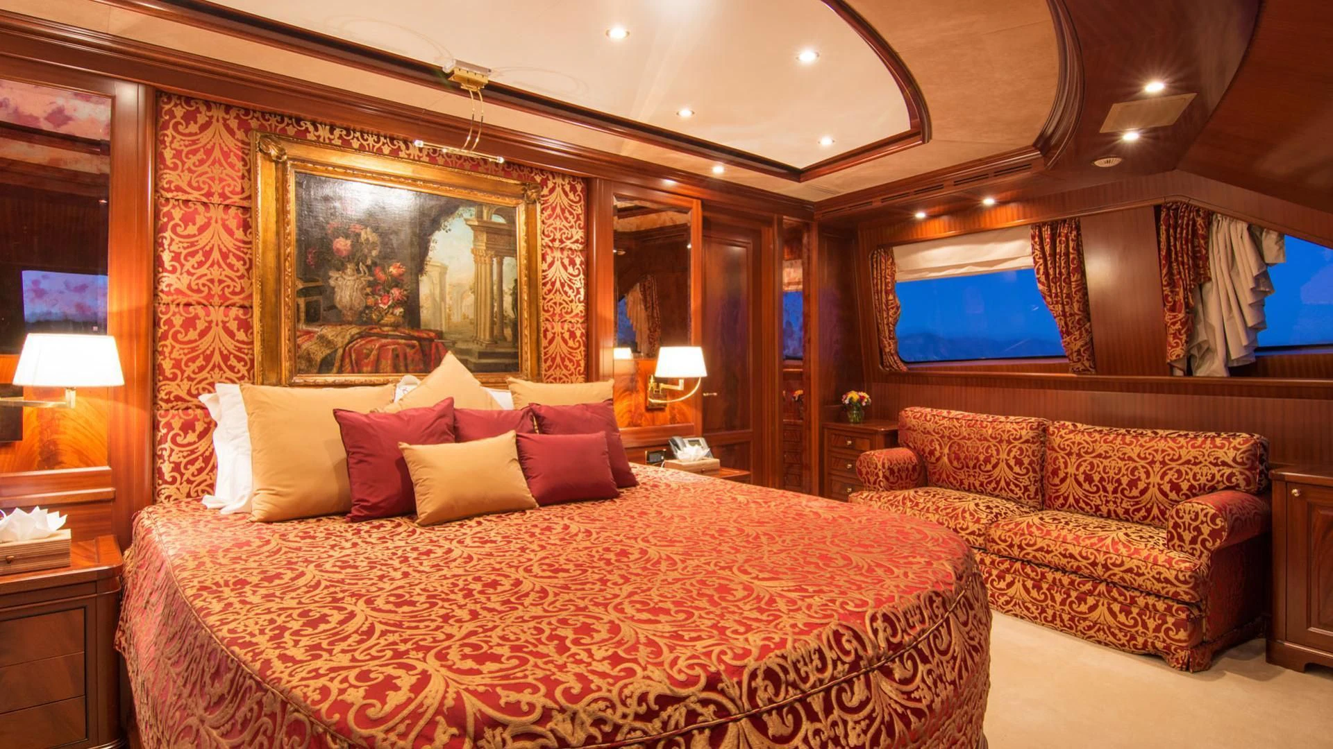 a large bed in a hotel room aboard OPTION B Yacht for Charter