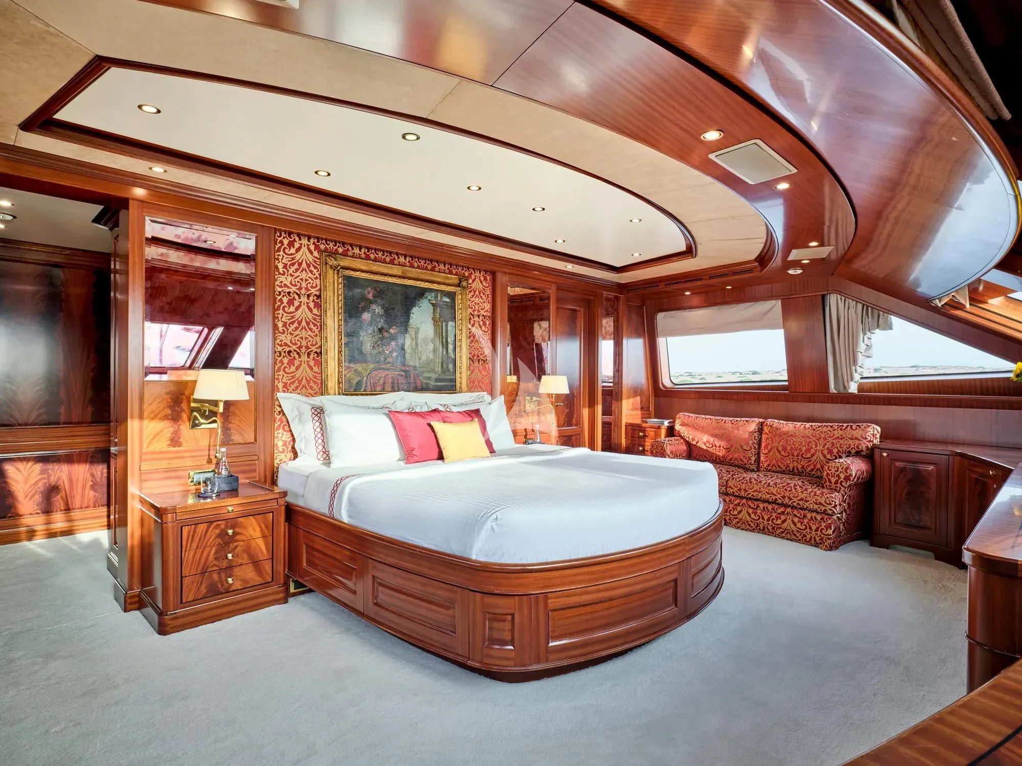 a large bedroom with a large bed aboard OPTION B Yacht for Charter