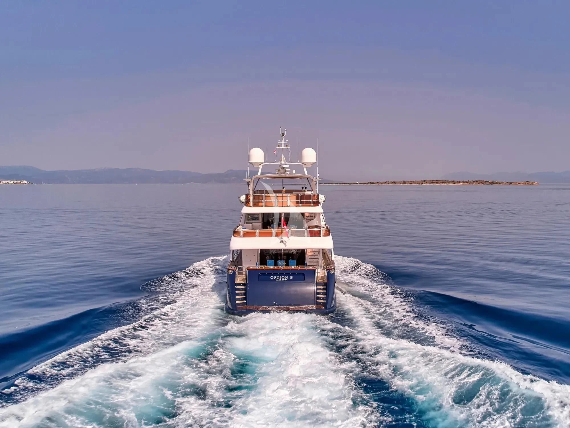 a boat on the water aboard OPTION B Yacht for Charter